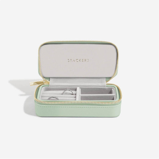 Mint green jewelry case with 'Stackers' branding on a white background