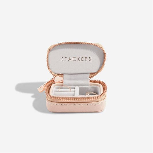 Open mini blush pink travel jewellery case with 'Stackers' branding on a white background