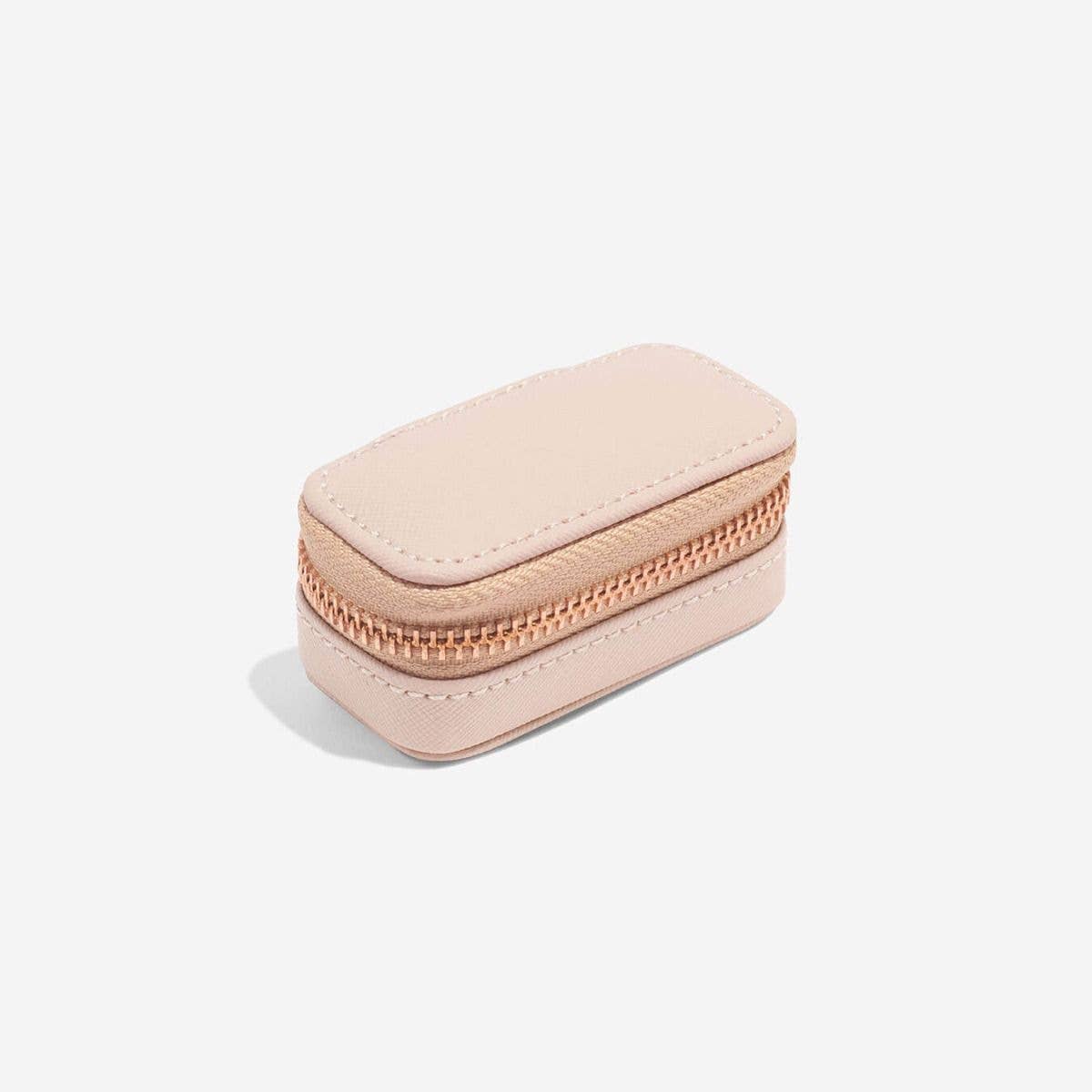 Mini blush pink Stackers jewellery box with a zipper on a white background