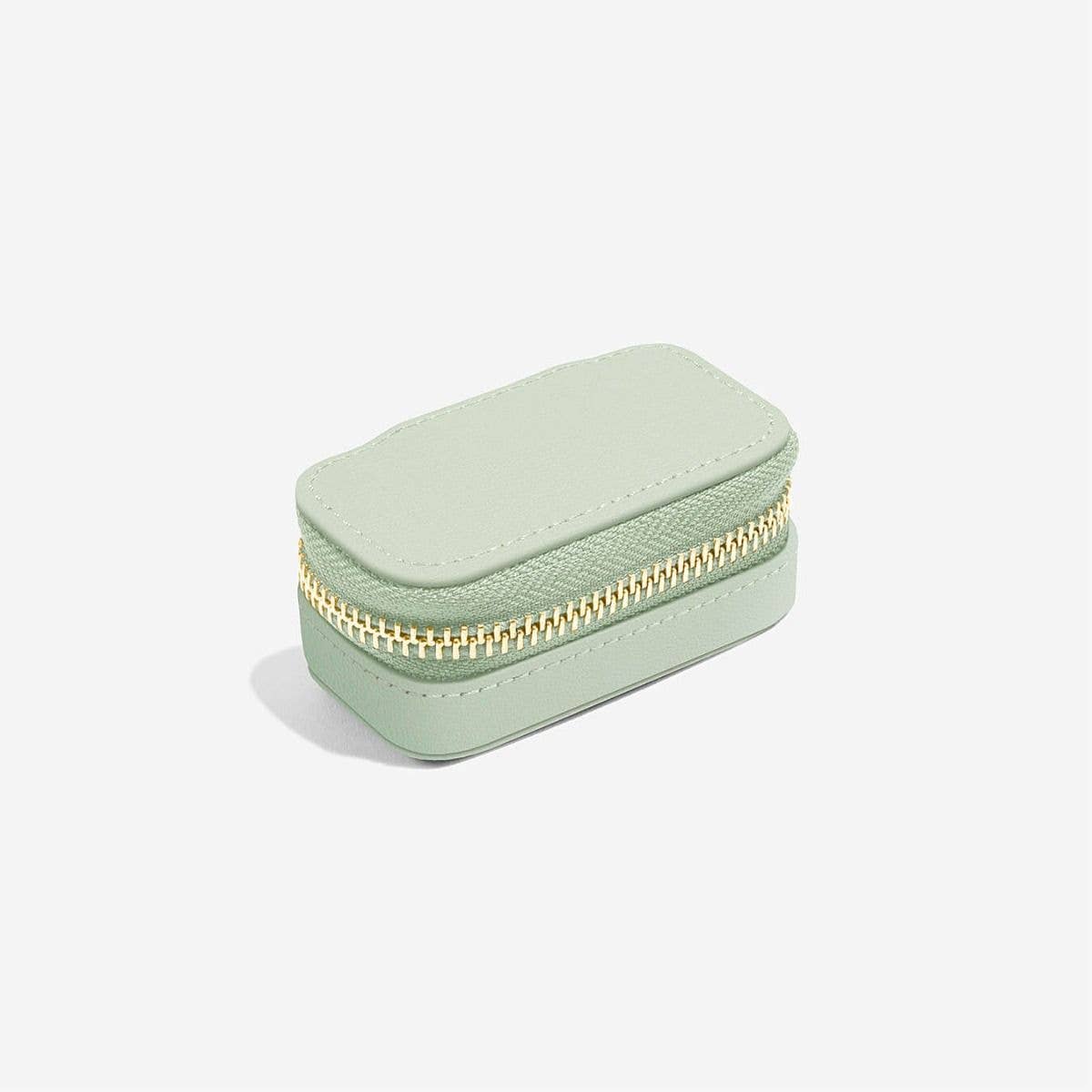 Mini mint green Stackers jewellery travel case with a gold zipper on a white background