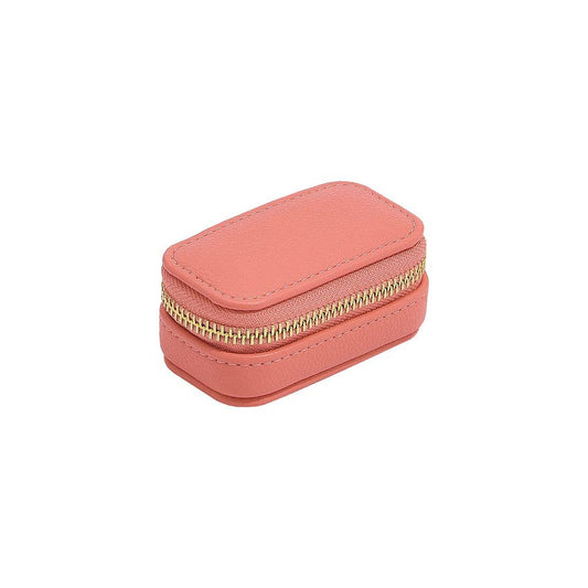 Grapefruit peach mini Stackers travel jewellery case on a white background