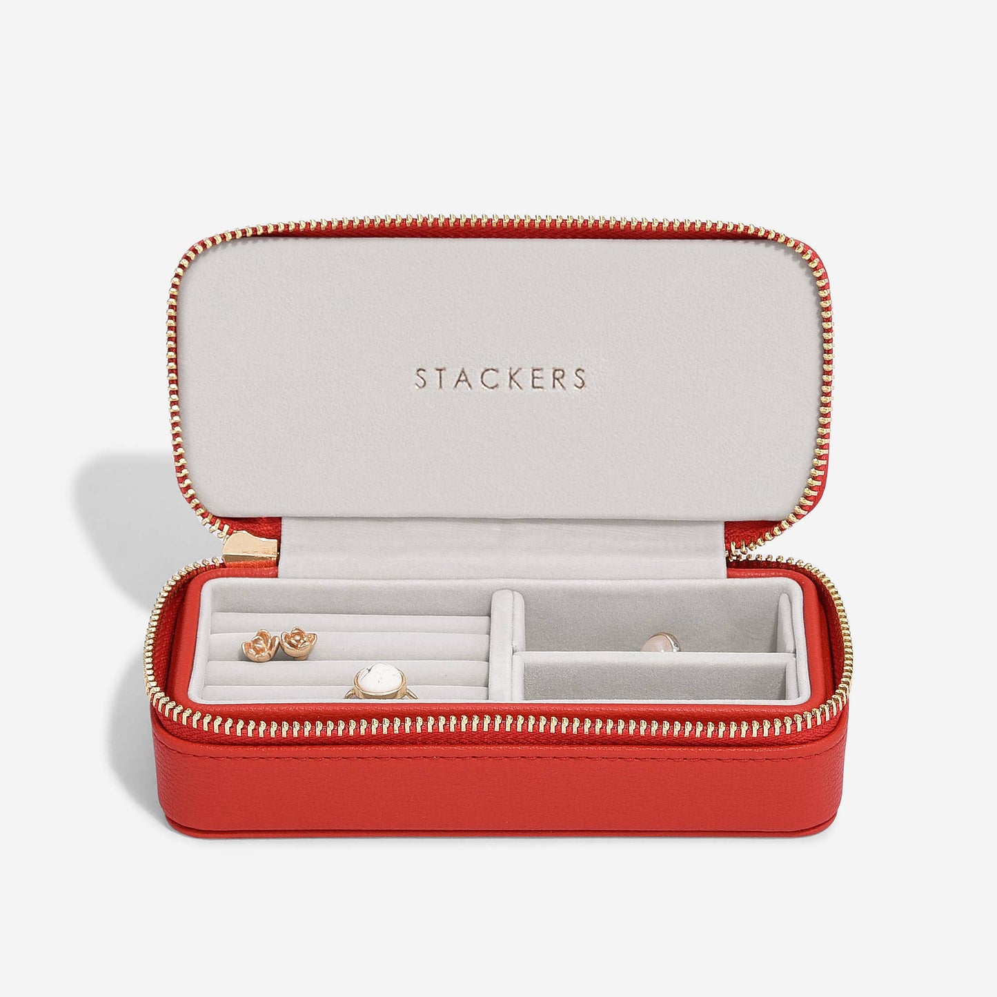 Red jewelry box with 'Stackers' branding on a white background