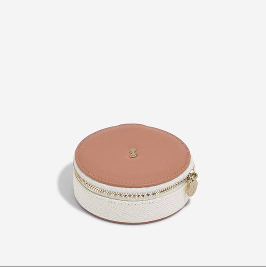 Stackers travel jewellery case, medium size, round in blush and cream, shown on a white background