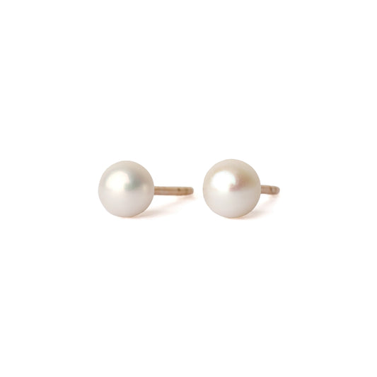 A pair of solid yellow gold and freshwater pearl earrings, small size. Both face forward and are set on a white background for the shopper to view.