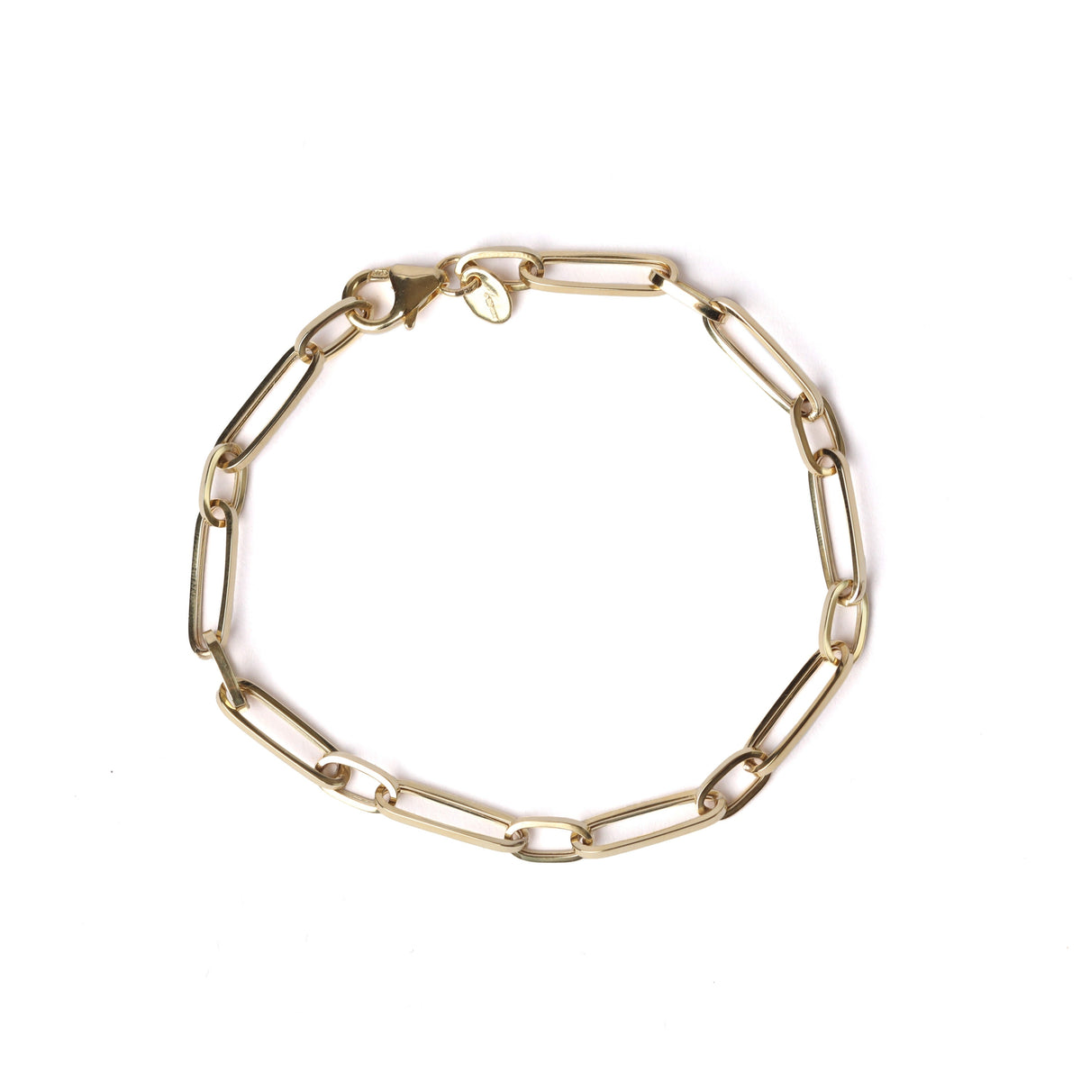 A woman's solid gold paperclip chain bracelet with a lobster clasp, displayed on a clean white background.