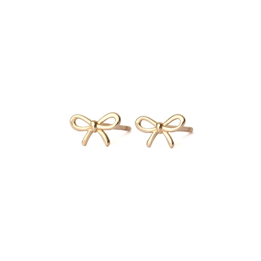 A pair of solid yellow gold bow studs, both facing forward displayed on a white background for the shopper to view.
