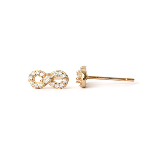A pair of solid yellow gold stud earrings set with cubic zirconia gemstones. One earring is face on the other sideways, both are set on a white background for the shopper to view.