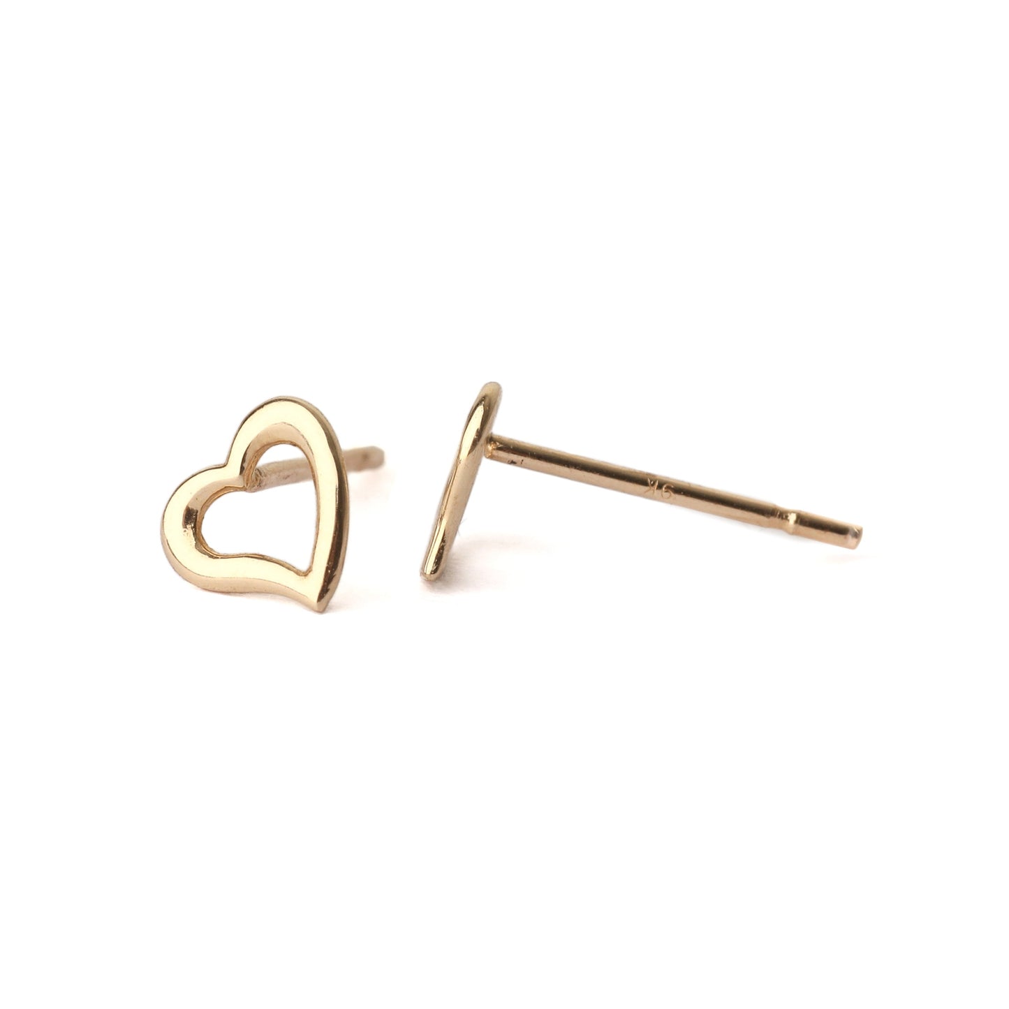 A pair of solid yellow gold heart shape earrings with an open centre, displayed on a white background, one facing forward and one side on for the shopper to see.