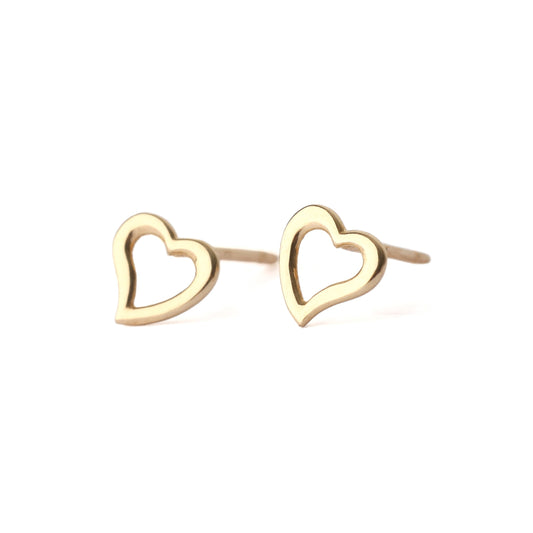 A pair of solid yellow gold heart shape earrings with an open centre, displayed on a white background, one facing forward and one side on for the shopper to see.