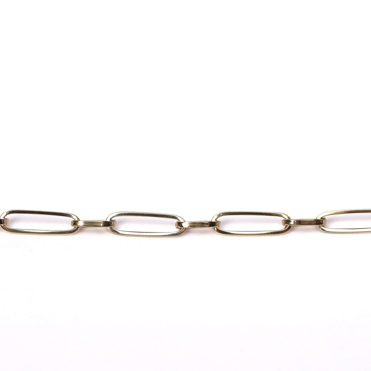 Women's solid yellow gold paperclip chain bracelet displayed on a white background.