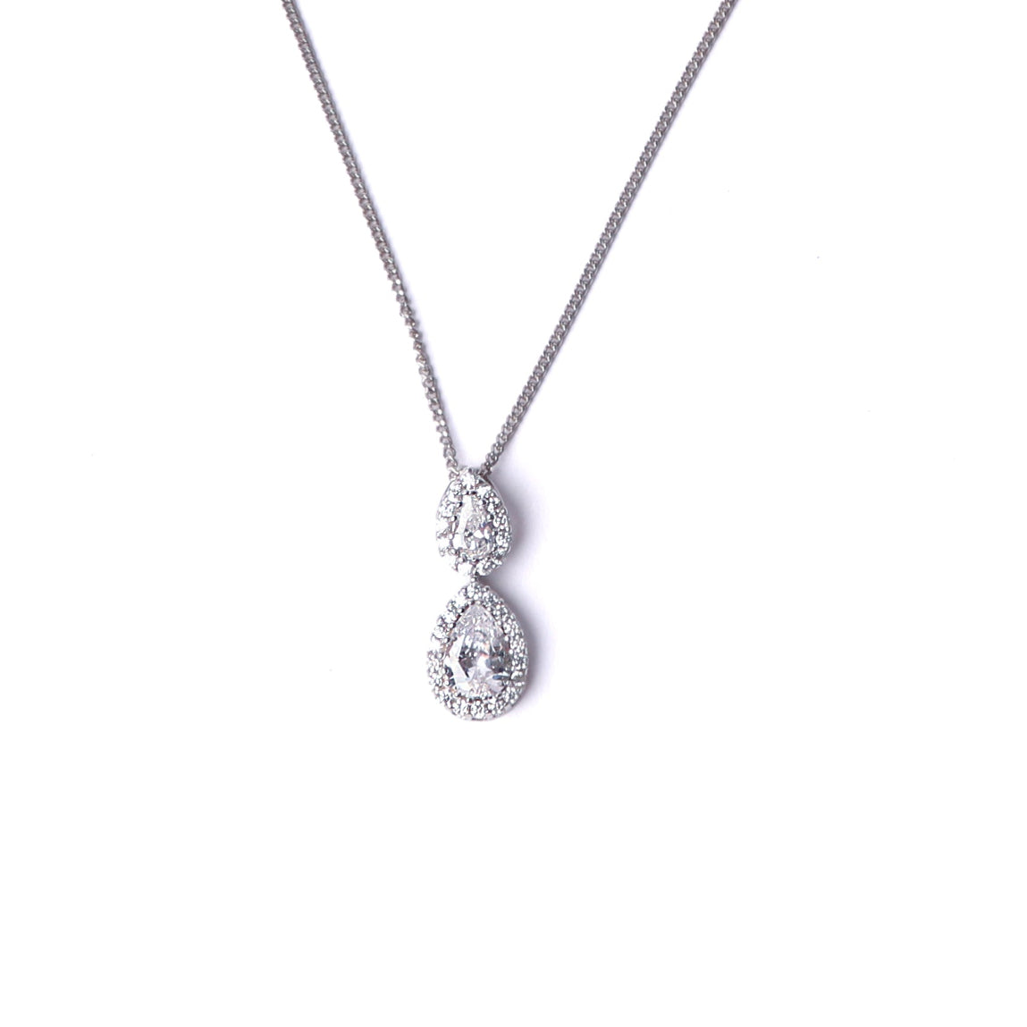 Women's sterling silver pendant with two pear shaped cubic zirconia gemstones surrounded by smaller cubic zirconia gemstones handing on a silver chain, set on a white background.