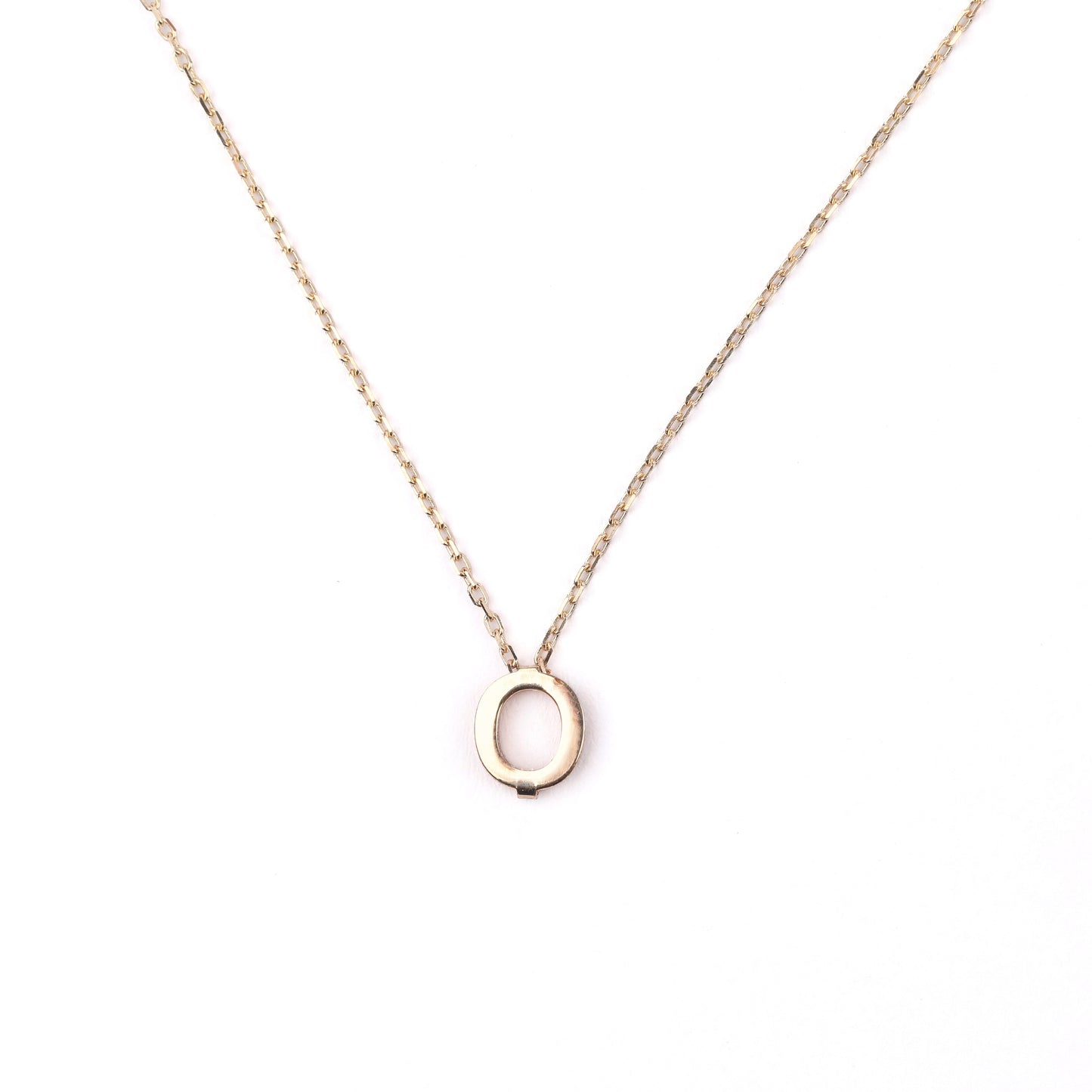women's solid gold necklace with an 'O' pendant on a white background